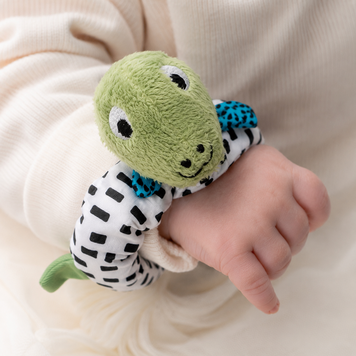 Ziggle Baby plišasta zapestna ropotuljica - dino