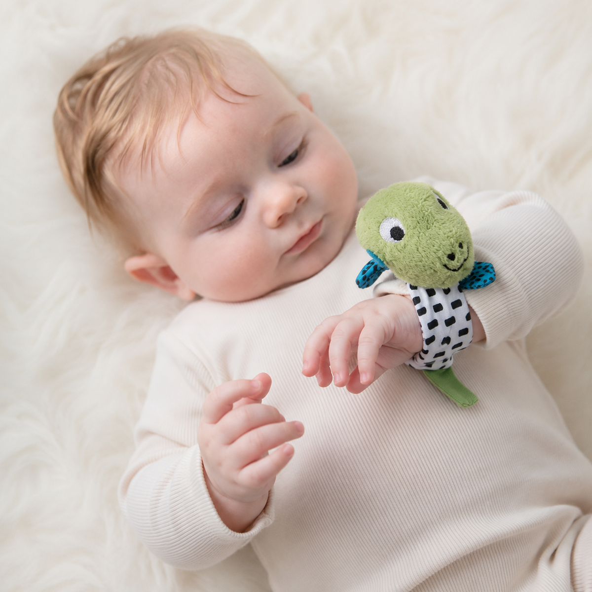 Ziggle Baby plišasta zapestna ropotuljica - dino